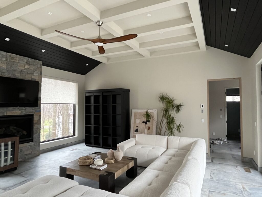 Interior painting project in Stamford CT with bold ceiling accents and a clean living room finish
