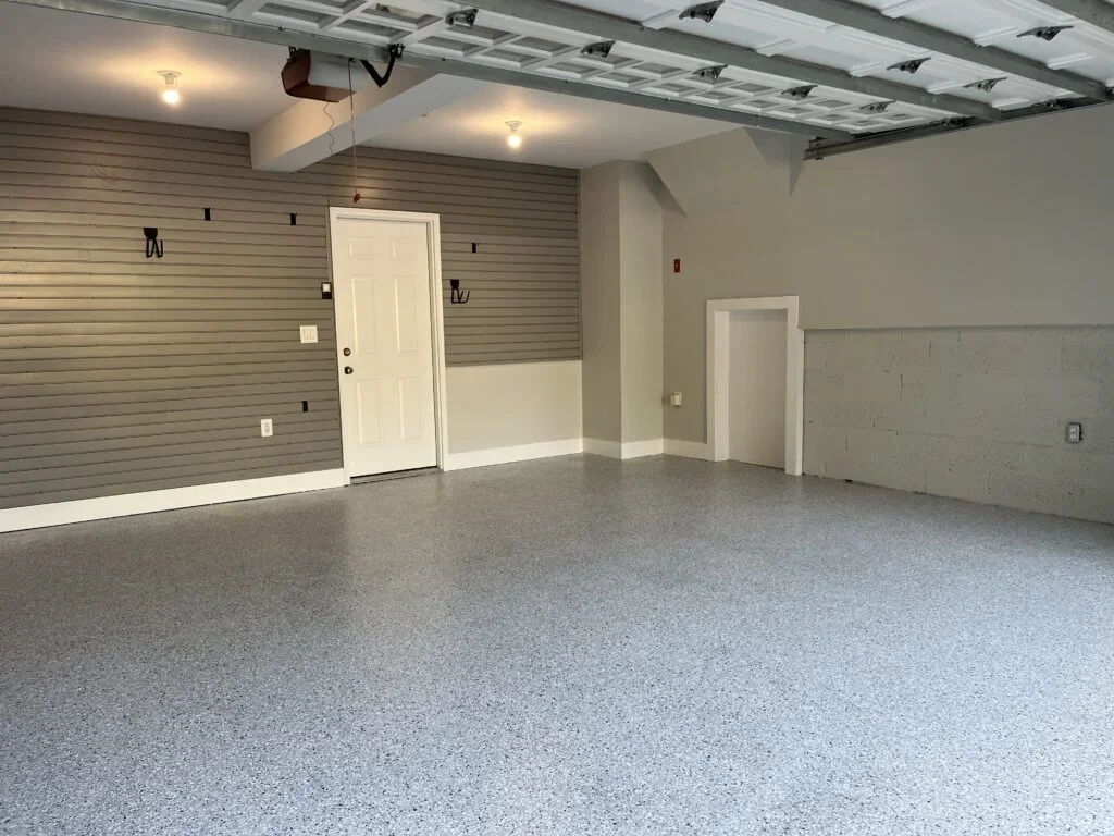 Epoxy floor coating project in Westport CT with clean gray flake system in a garage