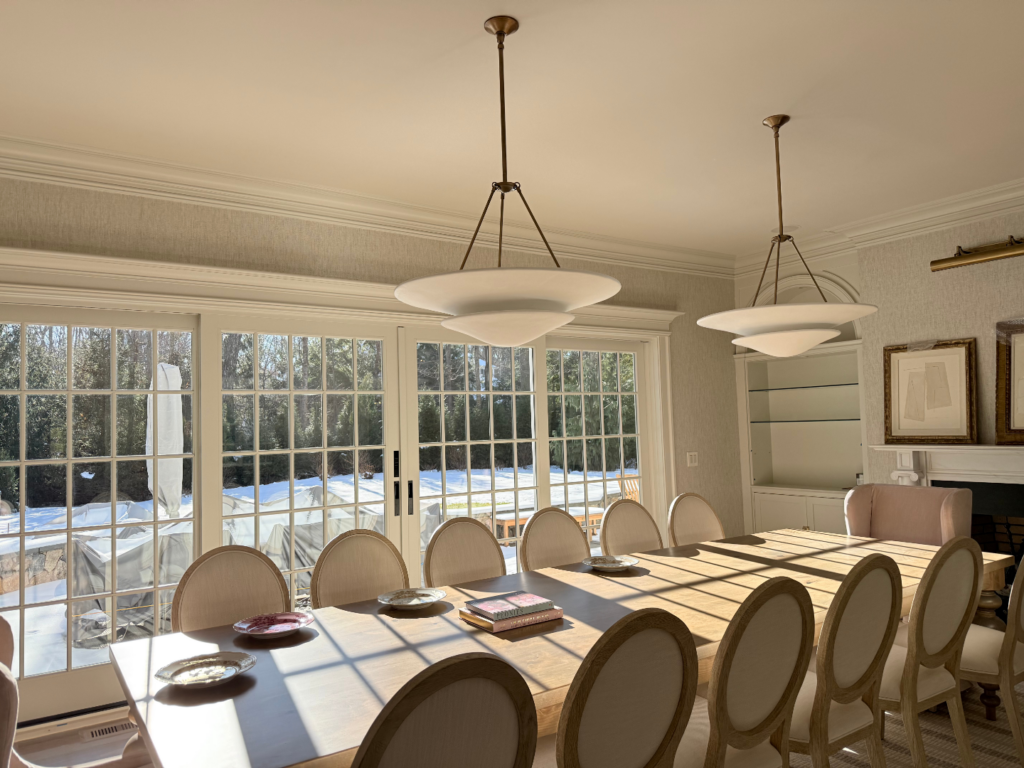Dining room painting project in New Canaan CT with soft neutral walls and bright natural light